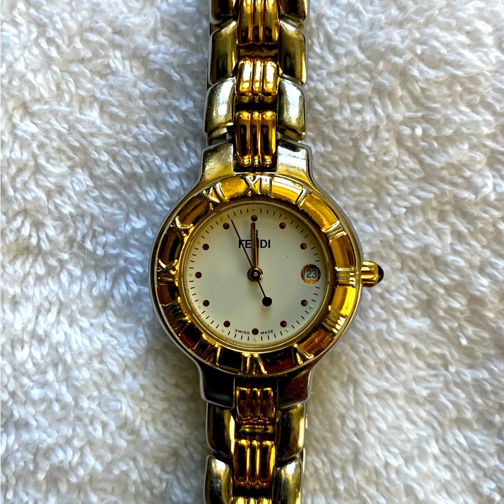 Genuine Fendi ladies gold and silver link watch. Bought at Fendi boutique in HI